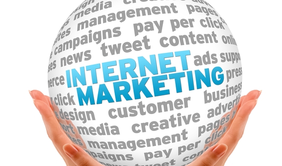 Internet marketing globe held in hands